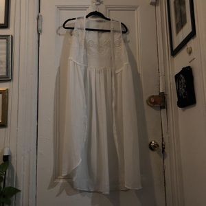 Beautiful white embroidered sheer flowy vest.